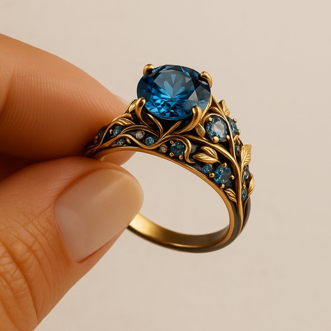 Exotische Blüete-Ring mit blauem Kristall